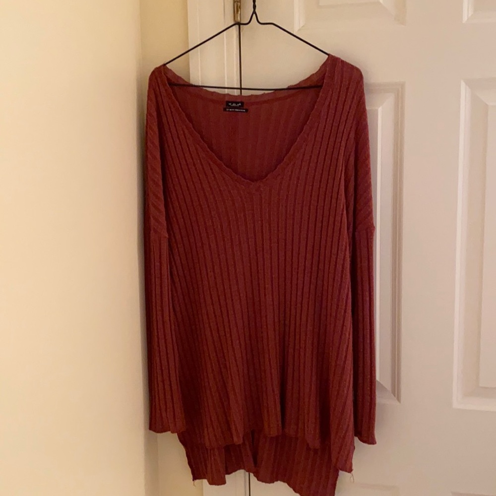 ribbed, burnt red out from under tunic